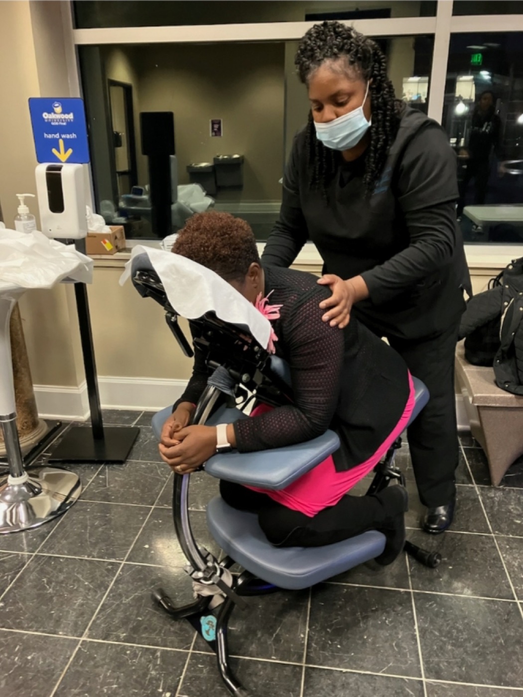 On-site chair massage at a Huntsville workplace