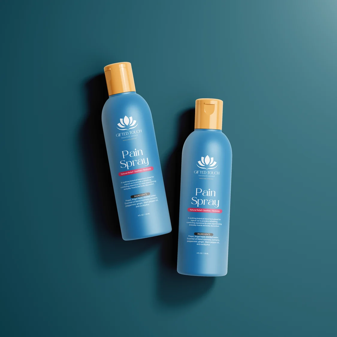 Two blue Pain Spray bottles with orange caps in their new Gifted Touch label